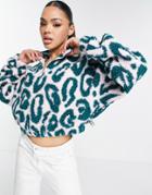 Reebok Classics Leopard Print Half Zip Sherpa Sweatshirt In Pink/blue