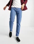 Asos Design Tapered Jeans In Flat Mid Wash Blue-blues