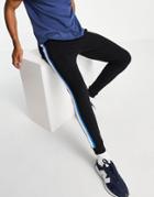 Asos Design Skinny Sweatpants With Side Stripe In Black