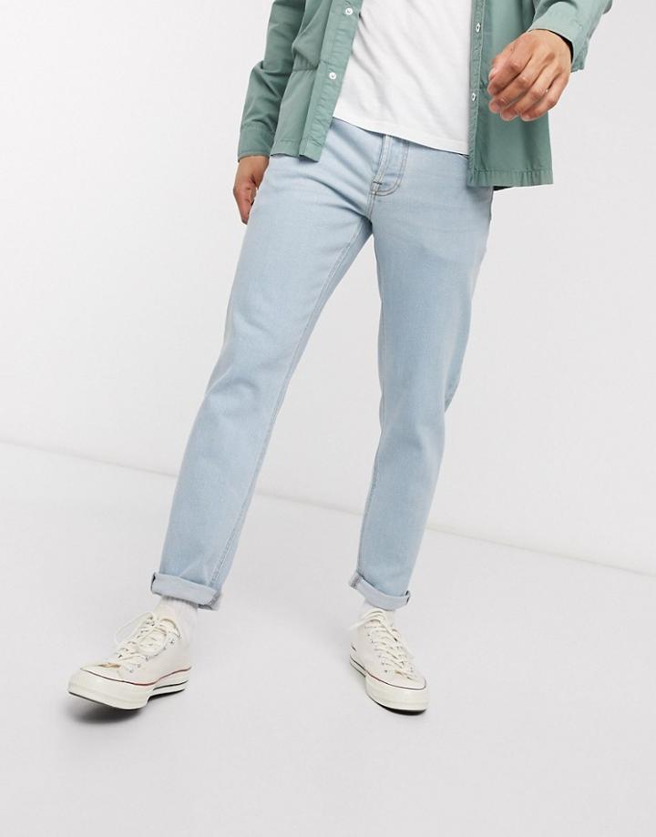 Asos Design Tapered Jeans In Light Wash-blues