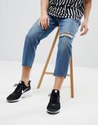 Mennace Tapered Jeans In Midwash Blue With Knee Rip - Blue