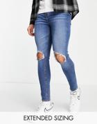 Asos Design Spray On Jeans In Power Stretch In Mid Wash Blue With Knee Rips
