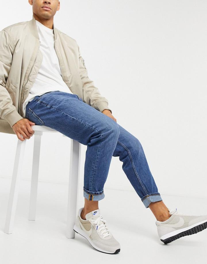 Pull & Bear Tapered Fit Jeans In Mid Wash Blue