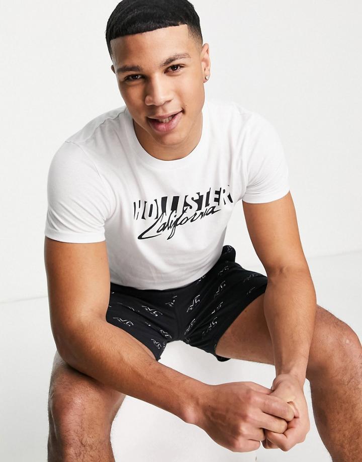 Hollister Lounge T-shirt And Shorts All Over Logo And Chest Logo - Part Of A Set-black
