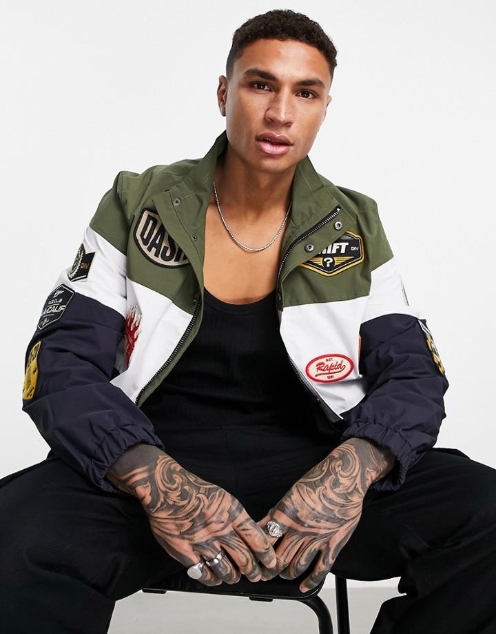 Guess Paul Color Block Jacket With All Over Badge Logos In Green/navy-multi