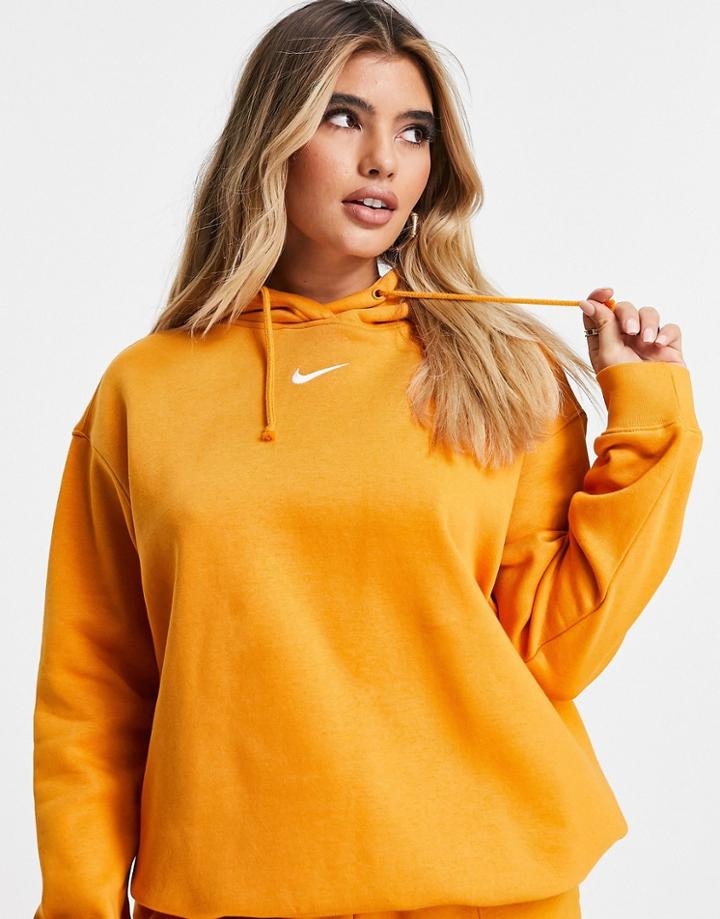 Nike Mini Swoosh Oversized Pullover Hoodie In Orange-yellow
