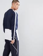 Asos Design Relaxed Longline Long Sleeve T-shirt With Color Block And Contrast Lace Up Hem - White