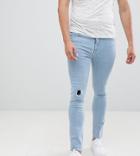Asos Design Super Skinny Jeans In Bleach Wash With Rip And Repair - Blue