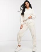 Puma Winter Classics Faux Fur Sweatpants In Cream-white