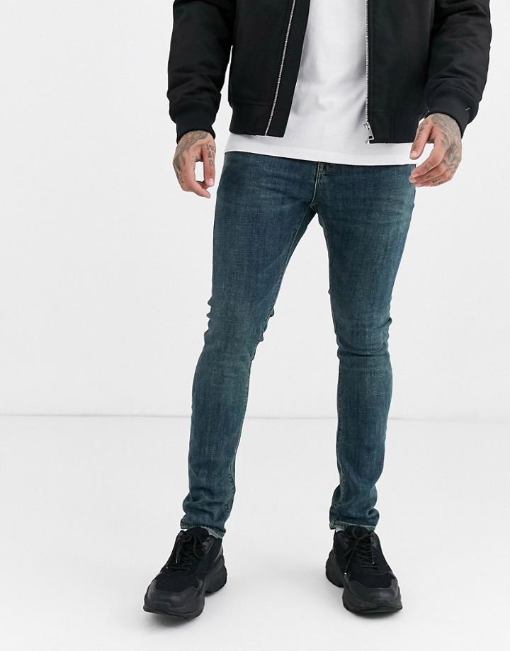 Asos Design Super Skinny Jeans In Vintage Dark Wash-blue