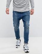 Asos Drop Crotch Jeans In Dark Wash Blue With Abrasions - Blue