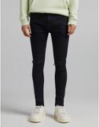 Bershka Super Skinny Jeans With Rips In Washed Black