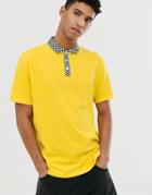Asos Design Organic Cotton Relaxed Polo Shirt With Woven Checkerboard Collar - Yellow