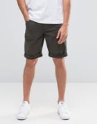 Asos Denim Shorts In Skinny Khaki With Camo Turn Up - Green
