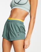 Puma Training First Mile Woven Shorts In Green