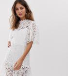 White Sand Cutwork Lace Mini Skater Dress With Peplum Hem In Ivory