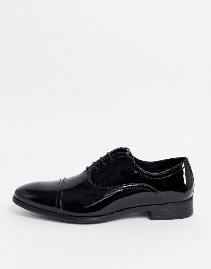 Red Tape Patent Leather Shoe In Black