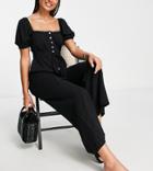 The Frolic Button Down Jumpsuit With Sleeve Detail In Black