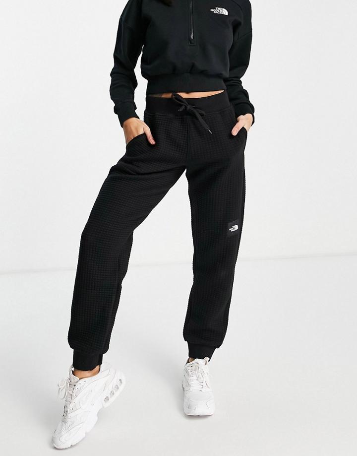 The North Face Mhysa Quilted Sweatpants In Black