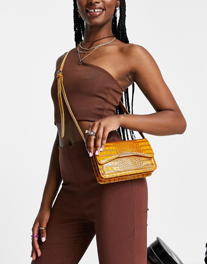 Asos Design Cross Body Bag With Bar Lock Detail In Mustard Croc-yellow