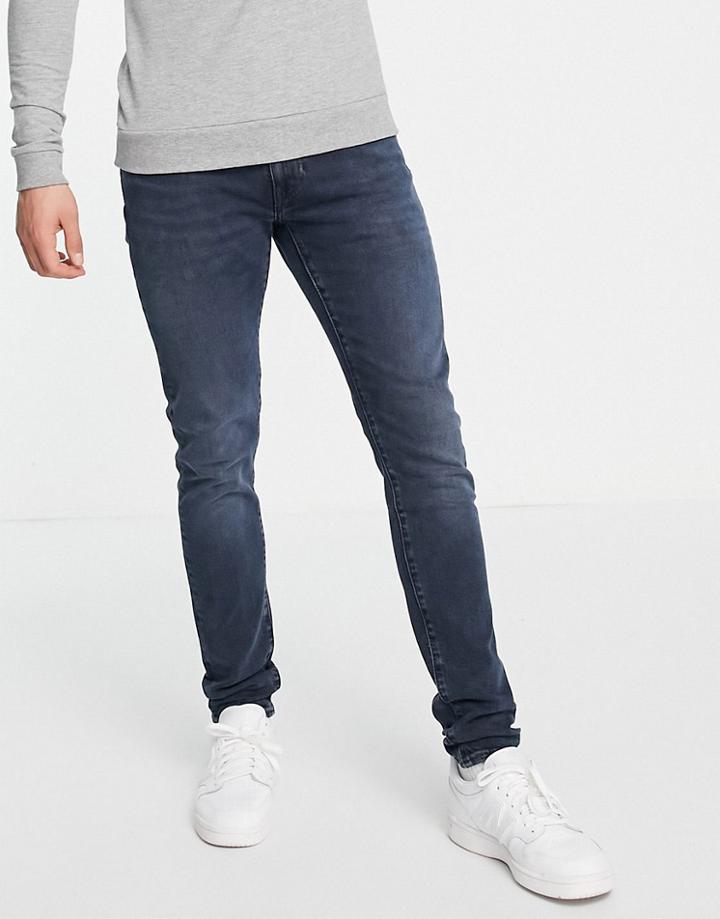 Levi's Skinny Tapered Fit Jeans In Dark Navy Overdye