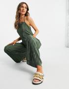 Asos Design Wide Leg Beach Plisse Jumpsuit In Khaki-green