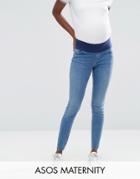 Asos Maternity Lisbon Skinny Jeans In Lara Mid Stone Wash With Stepped Hem With Under The Bump Waistband - Blue
