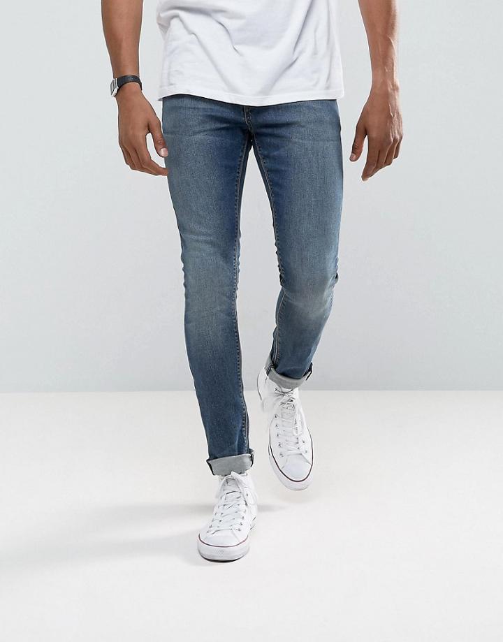 Asos Super Skinny Jeans In Dark Wash Blue - Blue