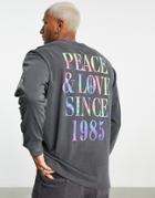 Tommy Jeans Peace And Love Tie Dye Back Print Long Sleeve Top Relaxed Fit In Black