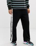 Asos Design Poly Tricot Tapered Sweatpants With Side Stripe And Poppers In Black - Green