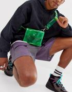 Asos Design Cross Body Flight Bag In Green Plastic With Laser Cut Slogan Strap