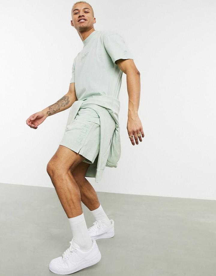 Nike Just Do It Washed Shorts In Green