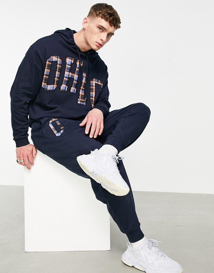 Asos Design Tapered Sweatpants With Applique Print - Part Of A Set-white
