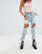 One Above Another Mom Jeans With Extreme Rips - Blue