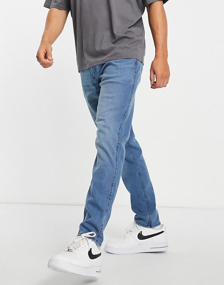 Hollister Slim Tapered Fit Jeans In Clean Bright Medium Wash-blues