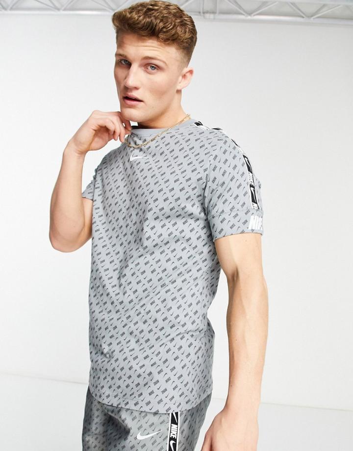 Nike Repeat Pack All-over Logo Print Taping T-shirt In Gray-grey