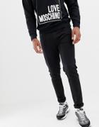 Love Moschino Skinny Fit Jeans With Back Pocket Plaque - Black