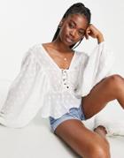 Asos Design Textured Long Sleeve Blouse With Lace Up Front & Peplum Hem In Ivory-white