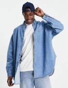 Asos Design Volume Overshirt Vintage Denim Shirt In Mid Blue