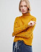 Shae Buttoned Sleeves High Neck Alpaca And Merino Wool Blend Sweater - Yellow