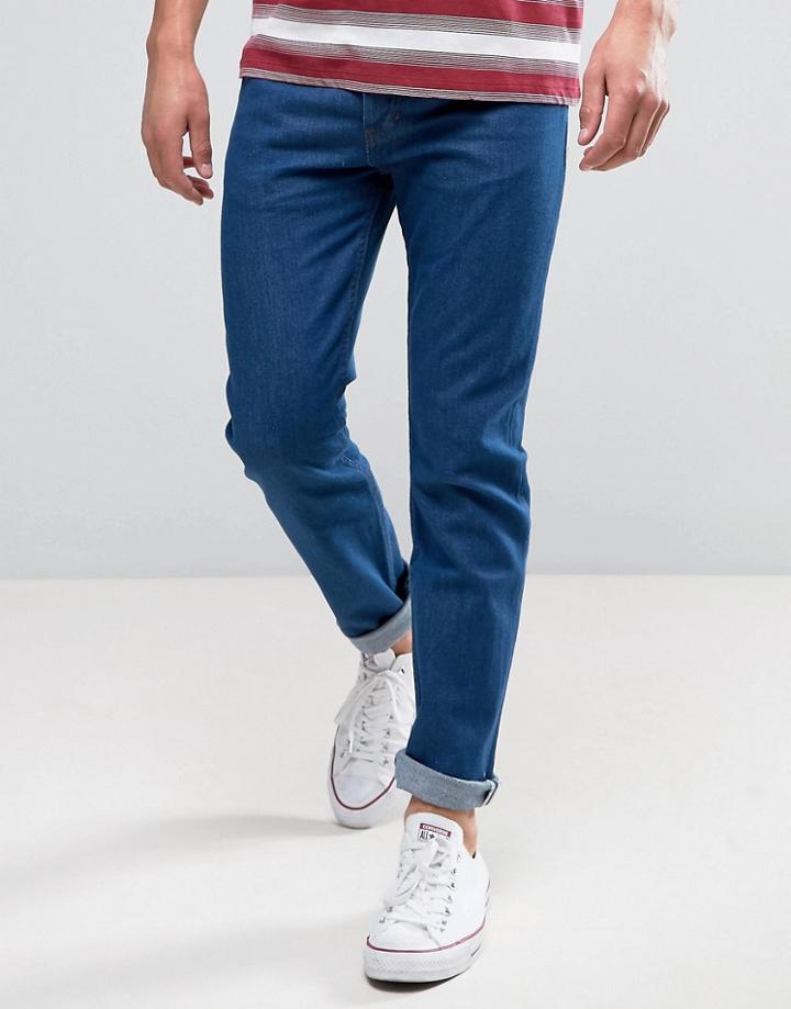 Wrangler Tapered Jeans In Rinse Wash - Blue