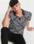 Asos Design Polo T-shirt In All Over Paisley Print In Polyester - Black
