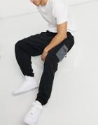 Asos Unrvlld Spply Oversized Sweatpants With Nylon Pockets And Drawstring-black