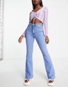 River Island Raw Hem Flared Jeans In Mid Blue