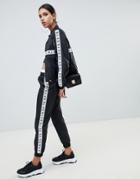 Na-kd Two-piece Logo Track Pants In Black - Black