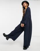 Asos Design Wrap Smock Jumpsuit With Button In Navy-blue