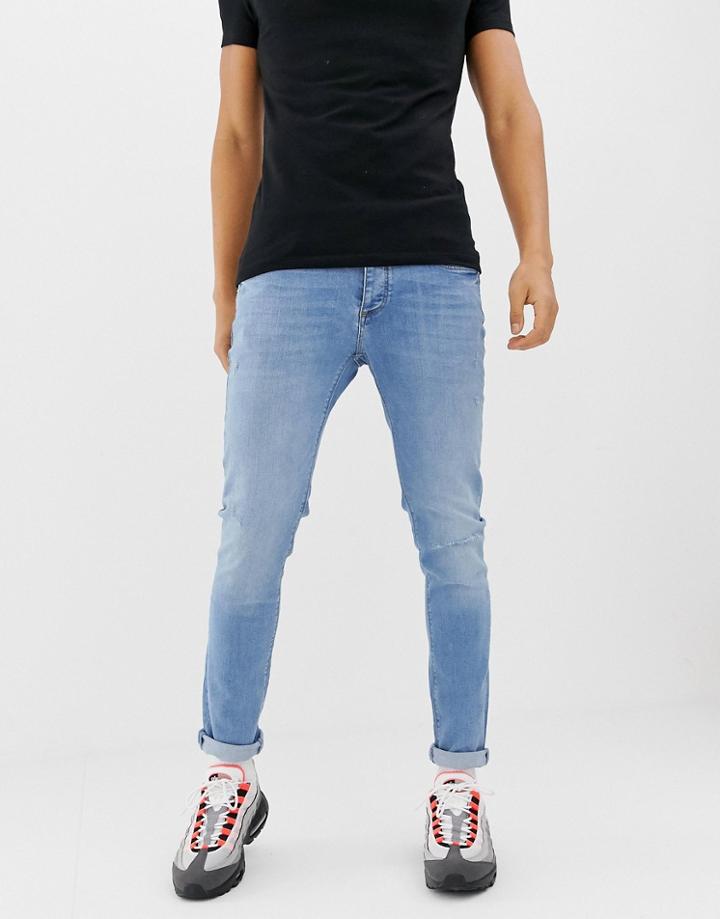 River Island Skinny Jeans With Abrasions In Light Wash Blue - Blue