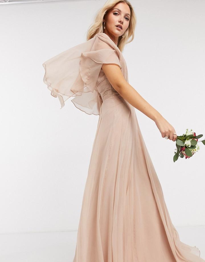 Asos Design Bridesmaid Ruched Bodice Drape Maxi Dress With Wrap Waist And Flutter Cape Sleeve In Blush-pink
