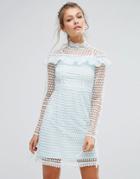 True Decadence High Neck Lace Mini Dress With Long Sleeves And Ruffle Details - Green