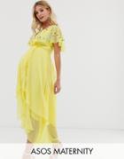 Asos Design Maternity Maxi Dress With Cape Back And Dipped Hem In Embellishment - Yellow